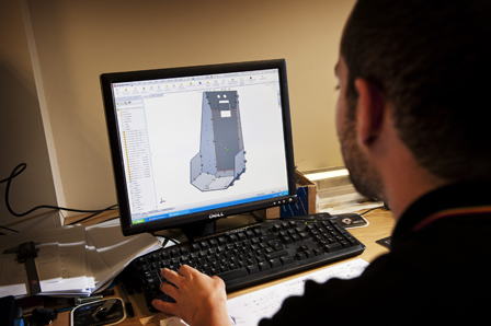 One of the team at work designing a product Product Design image
