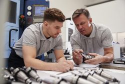 precision engineer man teaching precision engineering