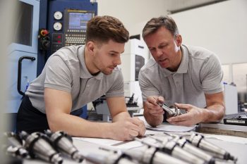 precision engineer man teaching precision engineering